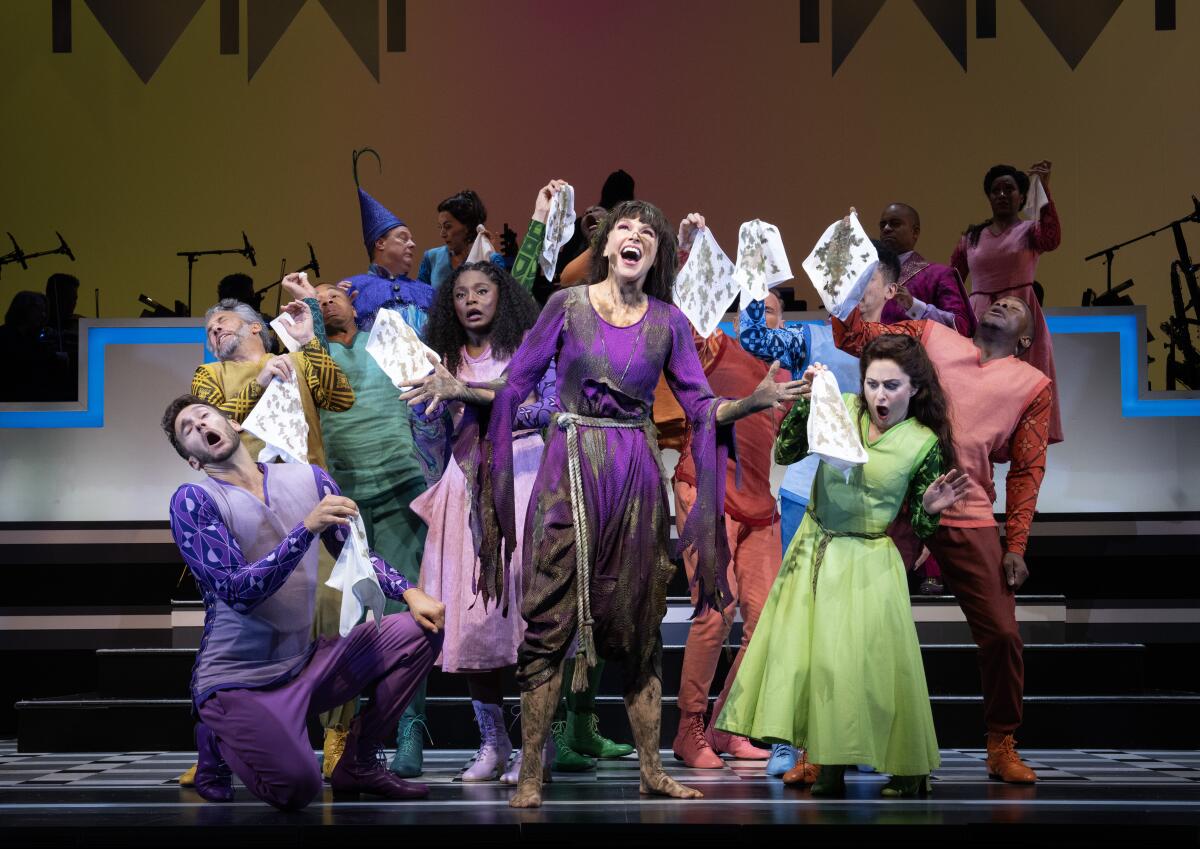 Sutton Foster, smudgy-faced and dressed in rags, backed by the Broadway cast of "Once Upon a Mattress."