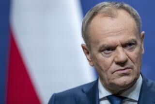 FILE - Poland's Prime Minister Donald Tusk pauses as he speaks, during a news conference following his meeting with Lithuania's Prime Minister Ingrida Simonyte at the government's headquarters in Vilnius, Lithuania, on March 4, 2024. (AP Photo/Mindaugas Kulbis, File)