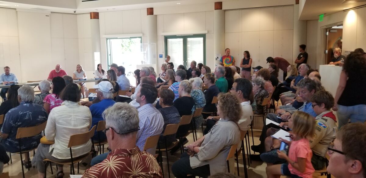 The community room at Point Loma Library is packed during the Peninsula Community Planning Board’s Special Meeting on Aug. 28, when community members offered feedback in regards to possible development at the Famosa Canyon.