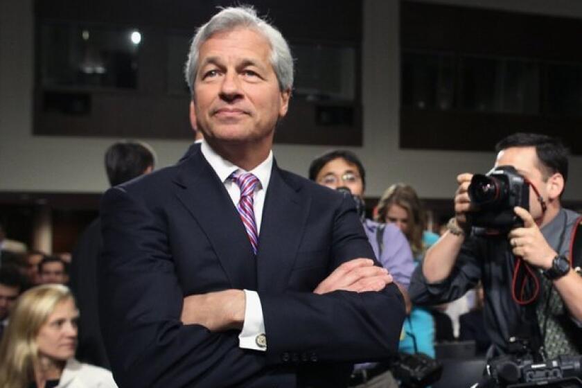 Still riding high: JPMorgan Chairman and CEO Jamie Dimon, unfazed by a $13-billion hit.