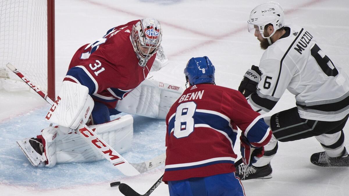 Montreal Canadiens goaltender Carey Price makes a save against Kings' Jake Muzzin.