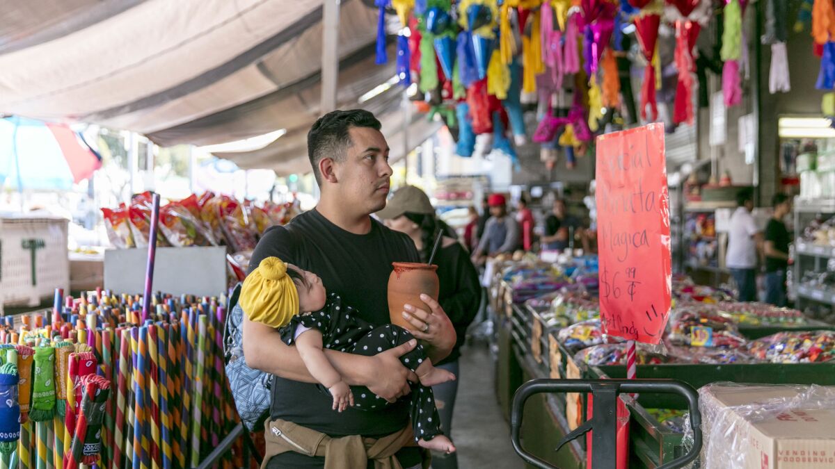 Piñata District, a street food market is a theater that overwhelms senses - Los Angeles Times