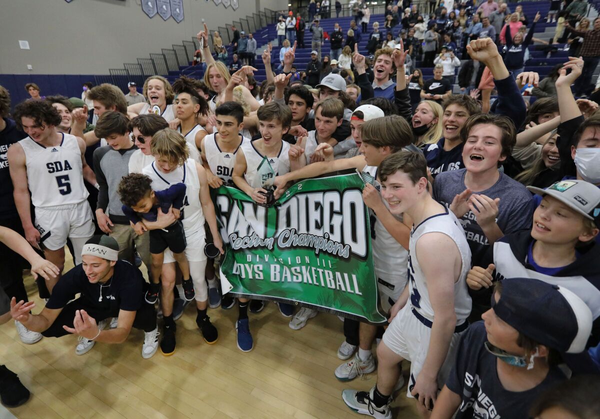 San Dieguito Academy players and their fans celebrate their championship on Thursday night.