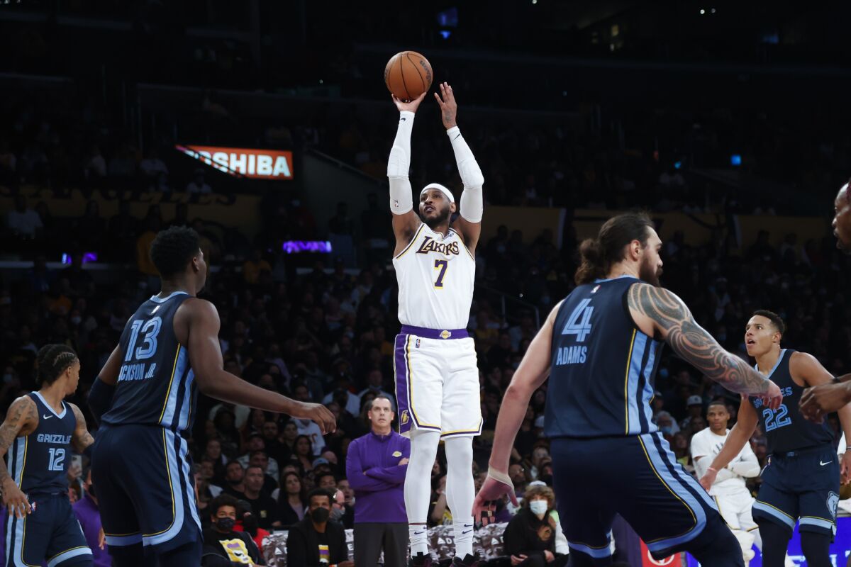 Lakers forward Carmelo Anthony shoots against the Memphis Grizzlies during the second half Sunday.