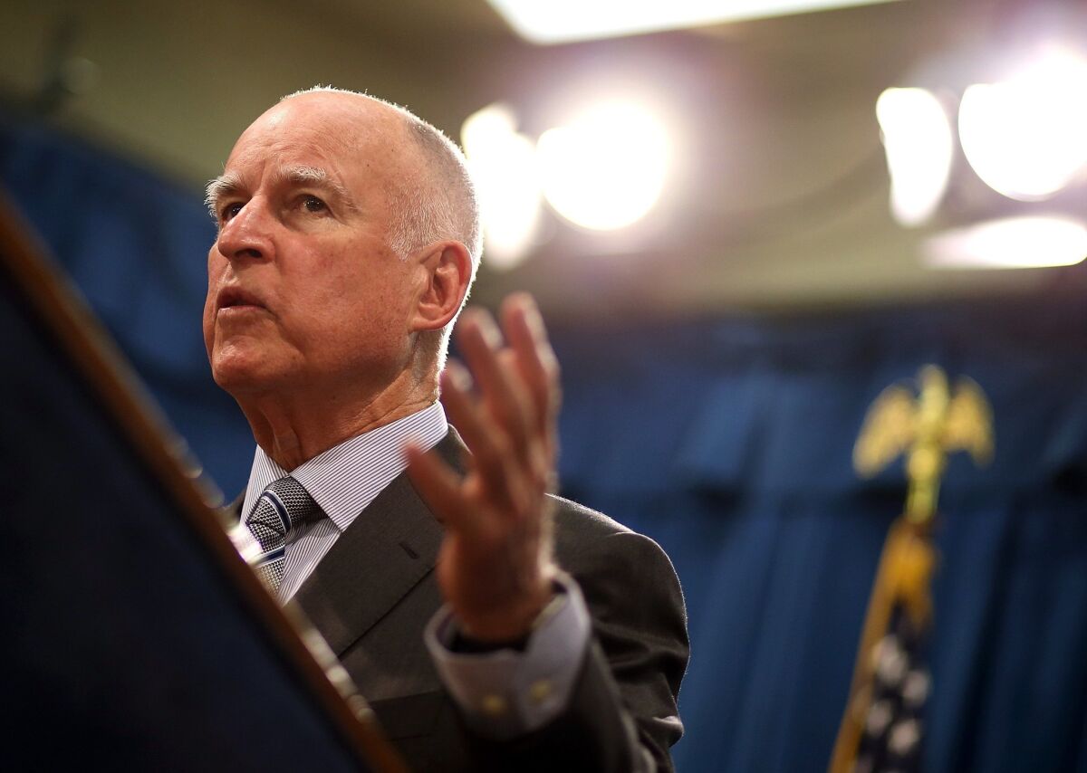 Gov. Jerry Brown speaks during a news conference Thursday to announce emergency drought legislation in California.