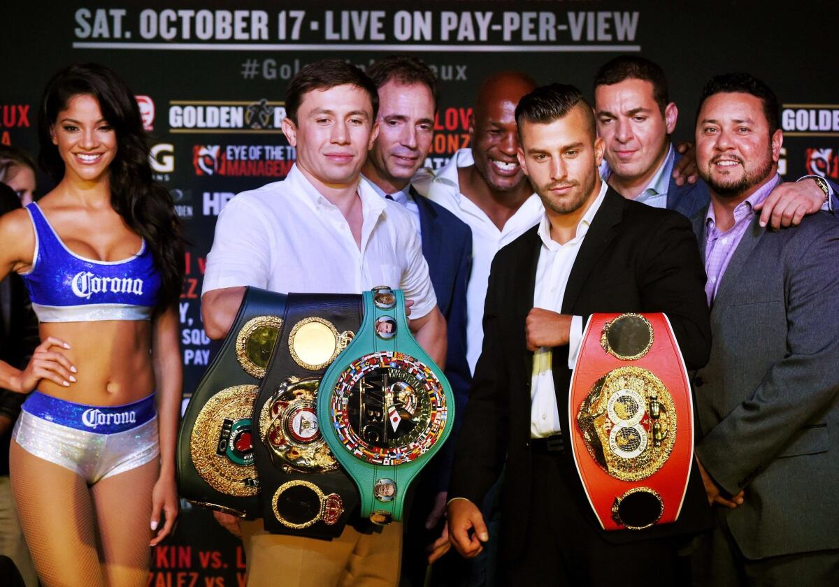 Boxers Gennady "GGG" Golovkin of Kazakhstan (2nd L) and David Lemieux of Canada (2nd R) pose during their press conference to promote their upcoming Middleweight World Championship Title Unification bout, in Los Angeles, California on August 20, 2015. The fight will take place at Madison Square Garden in New York on Saturday, October 17. AFP PHOTO / MARK RALSTONMARK RALSTON/AFP/Getty Images ** OUTS - ELSENT, FPG - OUTS * NM, PH, VA if sourced by CT, LA or MoD **