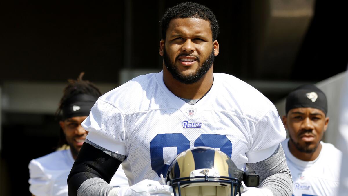 Rams defensive tackle Aaron Donald takes the field for a workout July 30.