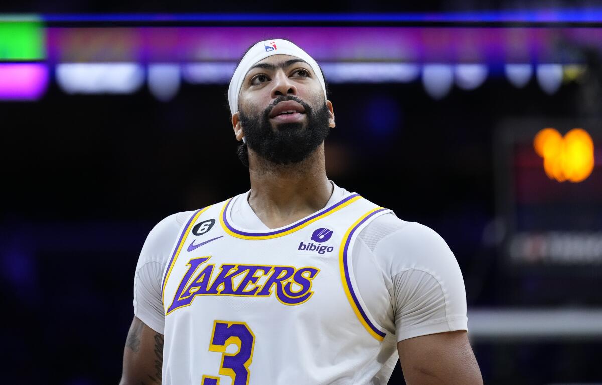 Lakers forward Anthony Davis looks into the stands.