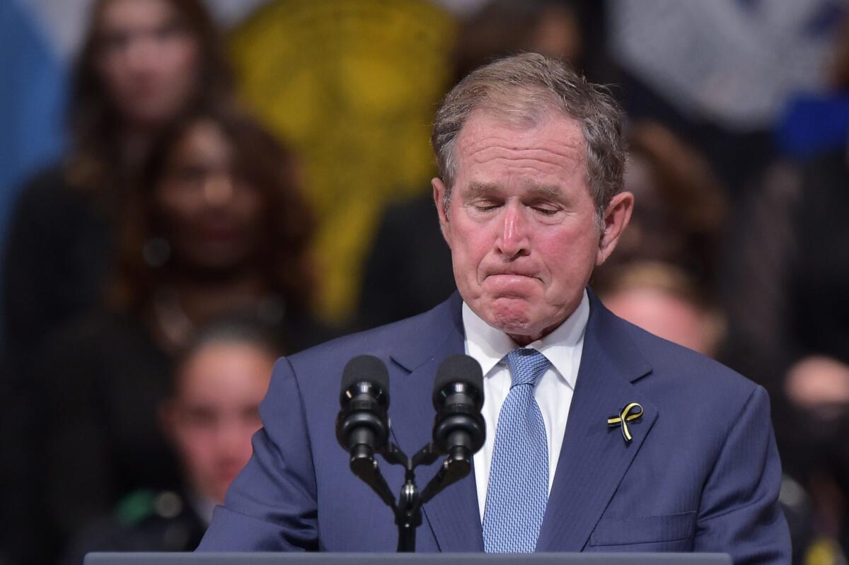 Former U.S. president George W. Bush speaks during an interfaith memorial service for the victims of the Dallas police shooting at the Morton H. Meyerson Symphony Center on July 12, 2016 in Dallas, Texas.