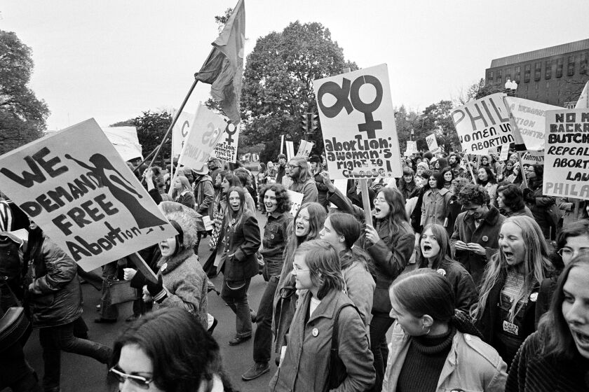 Demonstrators march to the U.S. Capitol for a rally seeking repeal of all anti-abortion laws in Washington in 1971