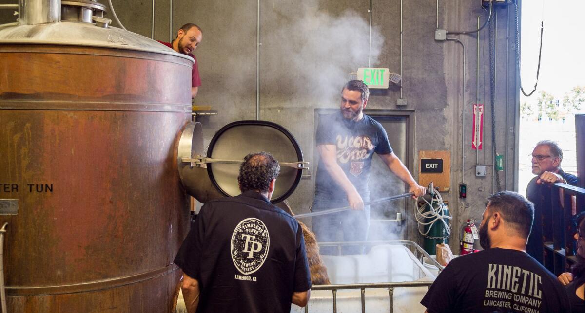 Representatives from a dozen local breweries combined their skills to produce Unity, the official beer of L.A. Beer Week, at Smog City Brewing in Torrance