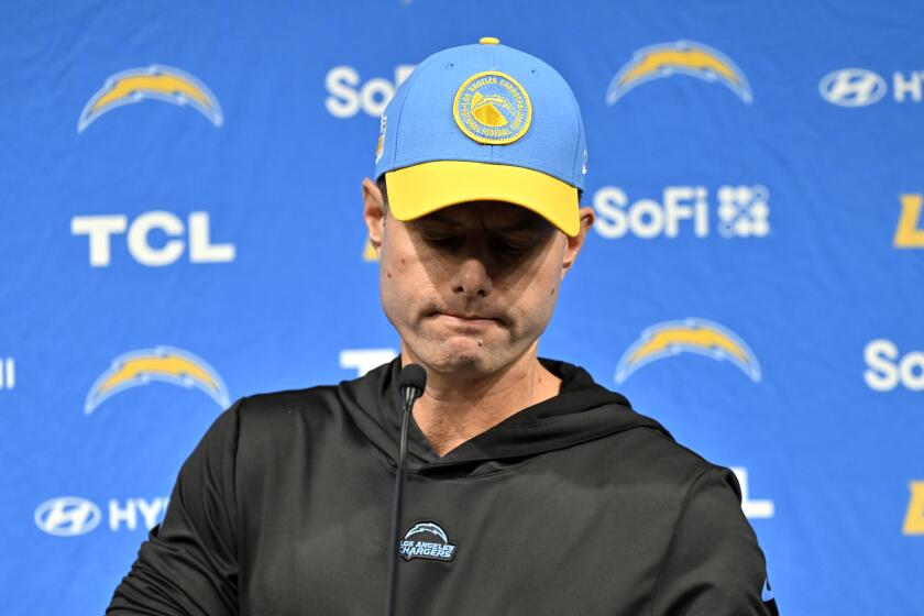 Chargers head coach Brandon Staley frowns at press conference following loss to the Raiders.