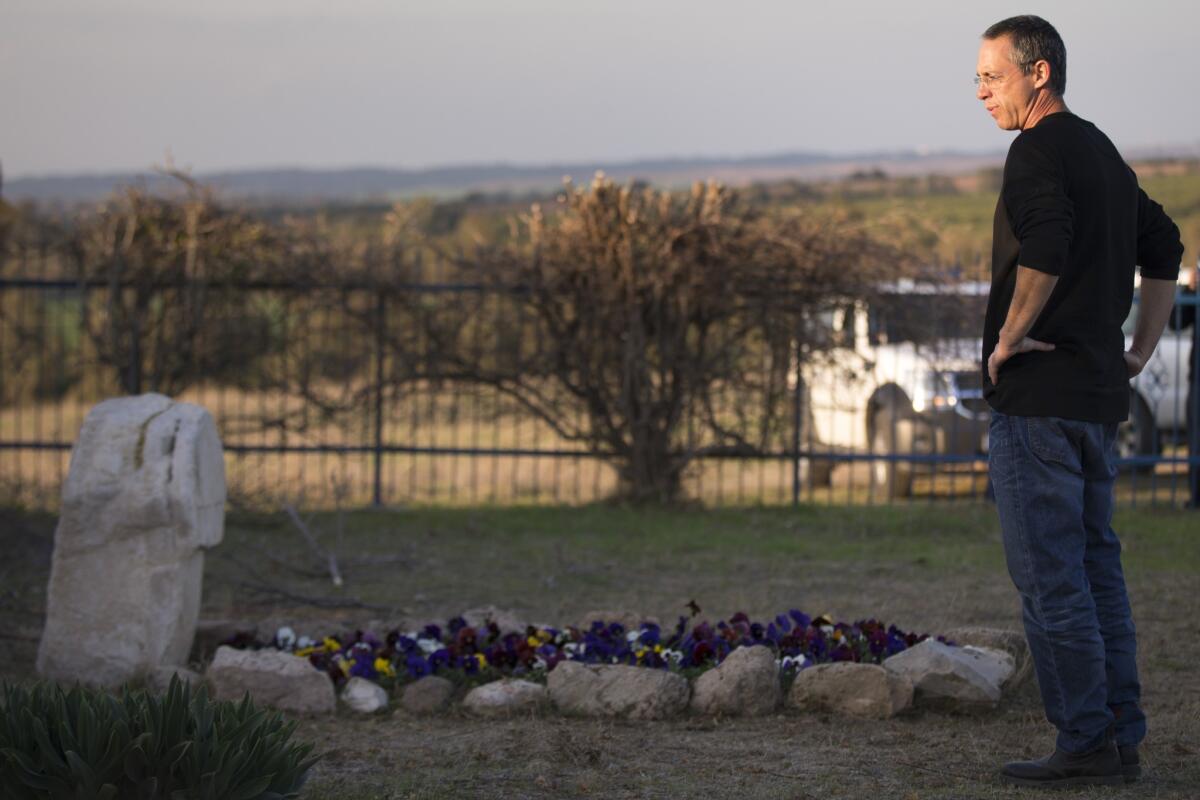 Gilad Sharon, son of former Israeli Prime Minister Ariel Sharon, visits the grave of his mother, Lily. Ariel Sharon died Jan. 11.