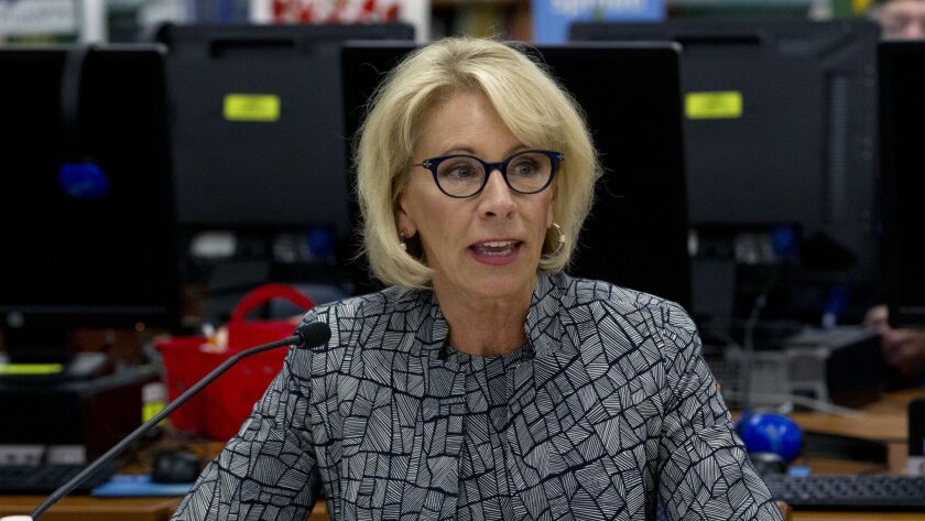 Education Secretary Betsy DeVos, in a file photo, said she has "no intention of taking any action" regarding any possible use of federal funds to arm teachers or provide them with firearms training.