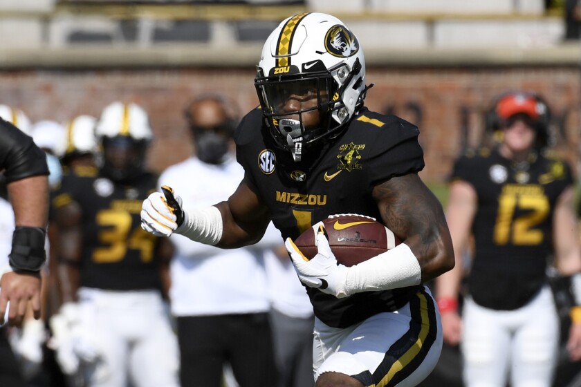 Missouri running back Tyler Badie runs with the ball against LSU on Saturday.