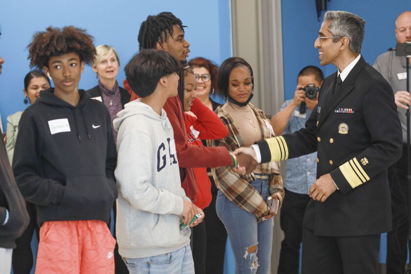 SAN DIEGO, CA-APRIL 4: Surgeon General Dr. Vivek Murthy speaks with students from Lincoln H.S. during a visit to the Jackie Robinson YMCA on Monday, Aril 4, 2022. (Photo by Sandy Huffaker for The San Diego Union-Tribune)