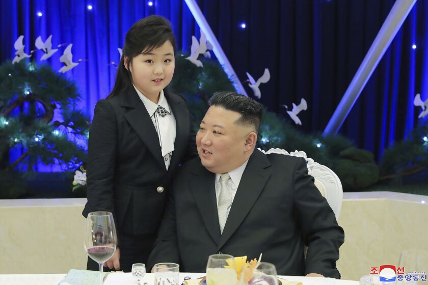 In this photo provided by the North Korean government, North Korean leader Kim Jong Un and his daughter attend a feast to mark the 75th founding anniversary of the Korean People’s Army at an unspecified place in North Korea Tuesday, Feb. 7, 2023. Independent journalists were not given access to cover the event depicted in this image distributed by the North Korean government. The content of this image is as provided and cannot be independently verified. Korean language watermark on image as provided by source reads: "KCNA" which is the abbreviation for Korean Central News Agency. (Korean Central News Agency/Korea News Service via AP)