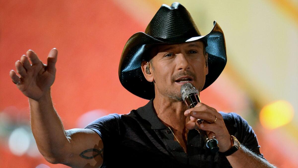 Tim McGraw performs during a 2014 tribute to the military at the MGM Grand Garden Arena in Las Vegas