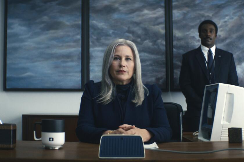 Patricia Arquette and Tramell Tillman in "Severance," premiering February 18, 2022 on Apple TV+.