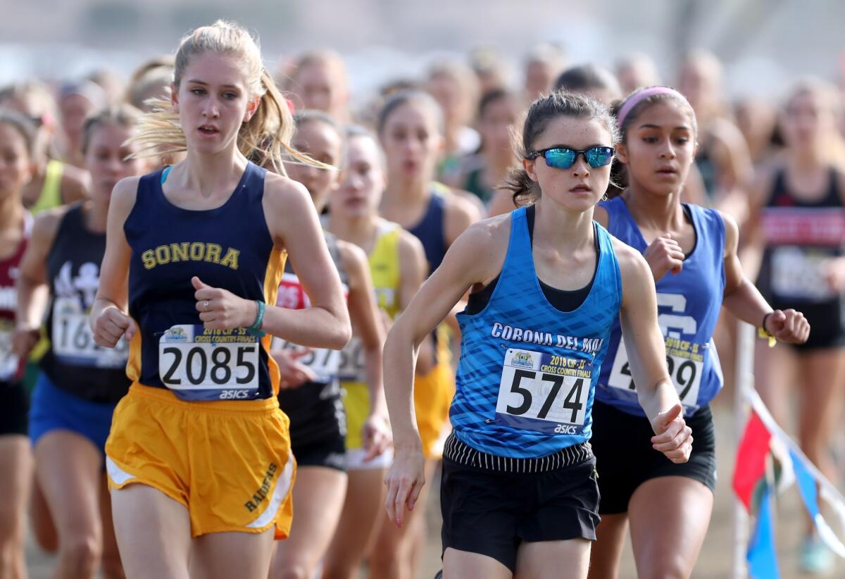 Corona del Mar's Annabelle Boudreau finishes second in the CIF Southern Section Division 3 finals at the Riverside City Cross-Country Course on Nov. 17, 2018.