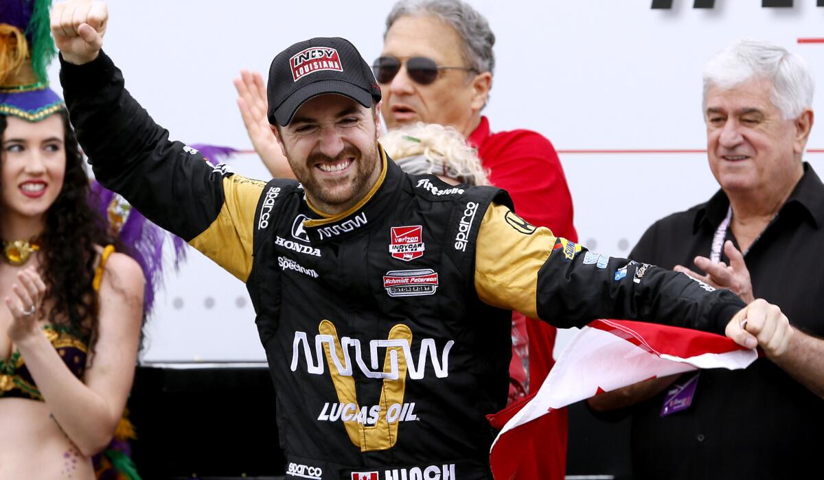 IndyCar driver James Hinchcliffe celebrates after winning the Grand Prix of Louisiana on Sunday in Avondale, La.