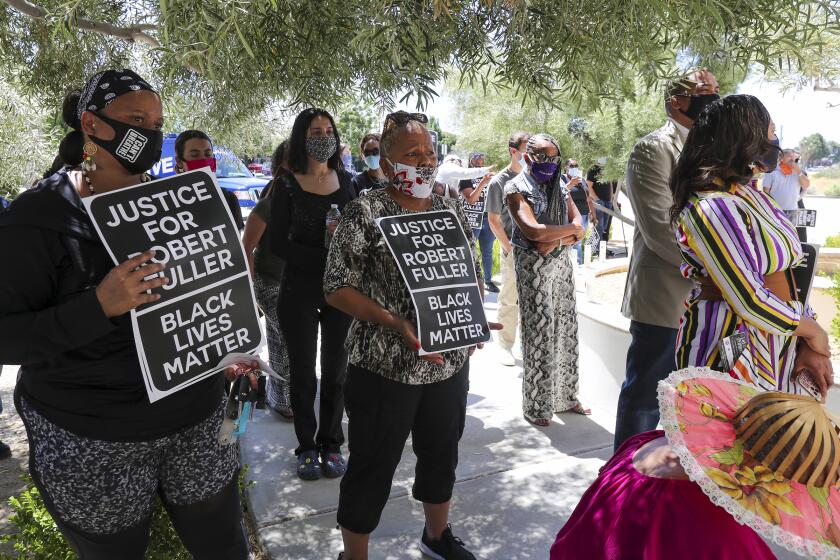 LANCASTER, CA - JUNE 18: A rally calling for justice and transparency in the deaths of Robert Fuller and Michael L. Thomas takes place in Lancaster in front of Supervisor Kathryn Barger's office on Thursday, June 18, 2020 in Lancaster, CA. (Irfan Khan / Los Angeles Times)