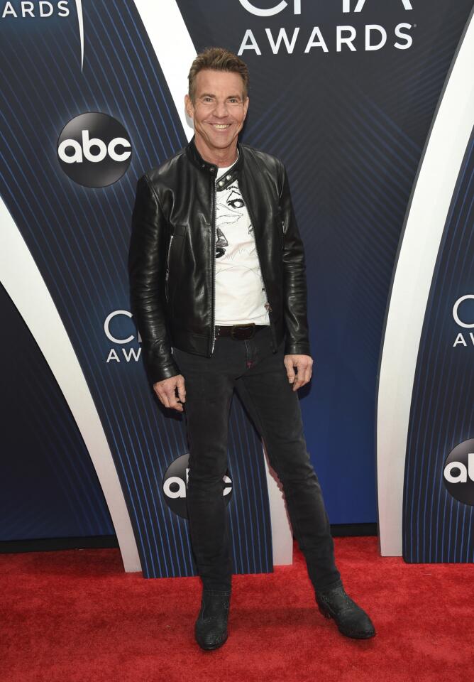 Actor Dennis Quaid arrives at the 52nd CMA Awards.