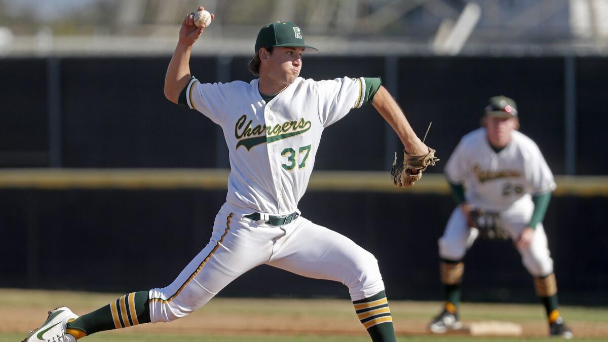 Edison High starter Kevin Hultgren throws against La Mirada in the first inning of a Downey Tournament game on Feb. 28.