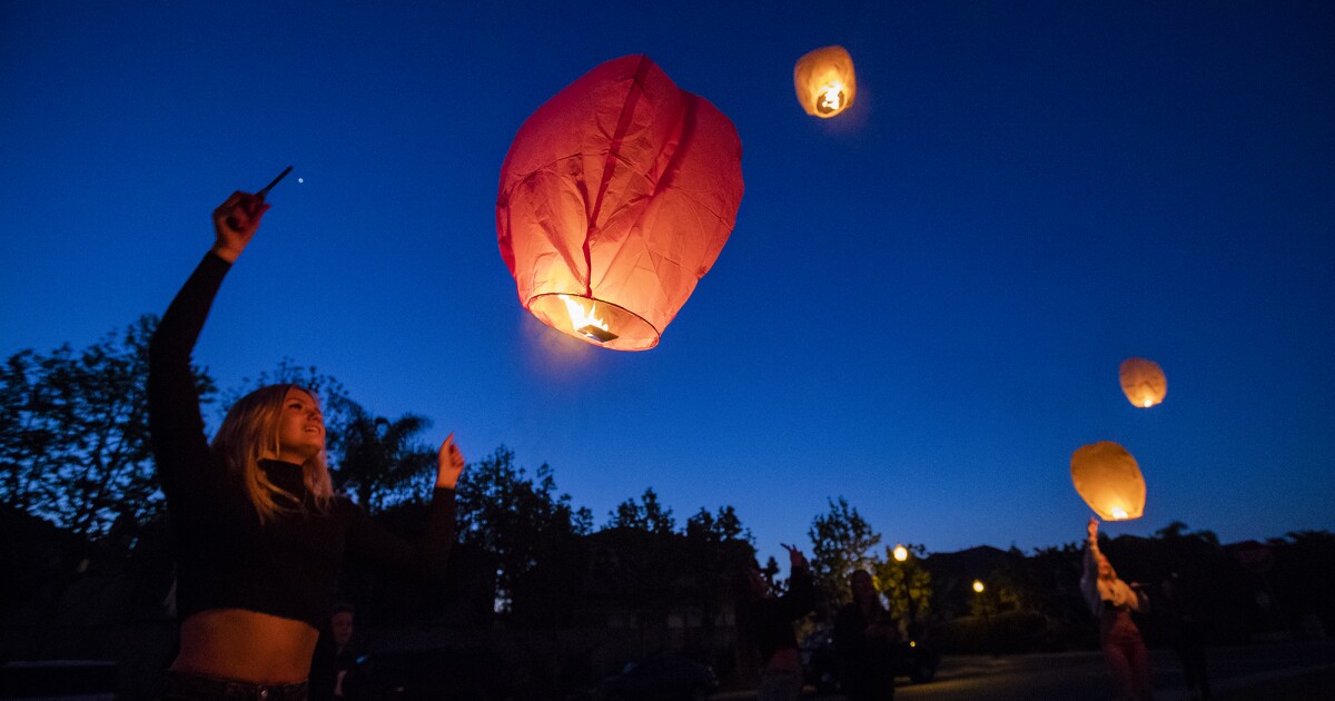 Lanterns Light Up The Sky To Help Huntington Beach Girl Celebrate Sweet 16th Los Angeles Times