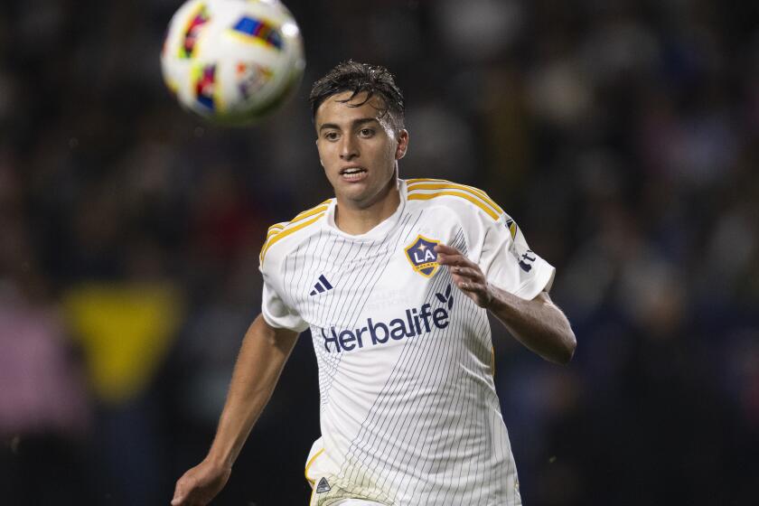 Los Angeles Galaxy defender Julián Aude (3) runs during the second half of an MLS soccer match against the Inter Miami, Sunday, Feb. 25, 2024, in Carson, Calif. (AP Photo/Kyusung Gong)