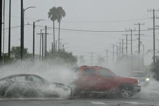 Vehicles splash up water during heavy rains from Hurricane Hilary, in south Los Angeles, California, on August 20, 2023. Hurricane Hilary weakened to a tropical storm on August 20, 2023, as it barreled up Mexico's Pacific coast, but was still likely to bring life-threatening flooding to the typically arid southwestern United States, forecasters said. Authorities reported at least one fatality in northwestern Mexico, where Hilary lashed the Baja California Peninsula with heavy rain and strong winds. (Photo by Robyn BECK / AFP) (Photo by ROBYN BECK/AFP via Getty Images)