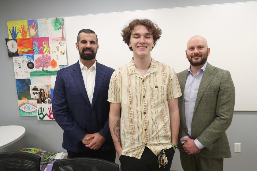 Clinical manager Dave Cook, Jackson Johansen, alumni, and Dr Sina Safahieh, from left, of the Hoag Young Adult Mental Health Program that expanded from Irvine to Newport Beach.