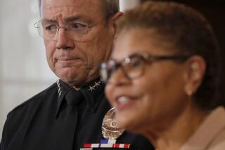 Los Angeles, CA - Los Angeles Mayor Karen Bass, right, and Los Angeles Police Department Chief Michel Moore hold a press conference at L.A. City Hall on Friday, Jan. 12, 2024, to announce the chief's retirement, pending a replacement. (photographer} / Los Angeles Times
