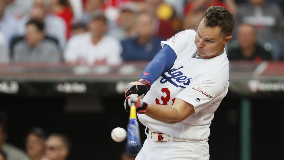 Joc Pederson hits during the All-Star Home Run Derby in Cleveland on Monday.