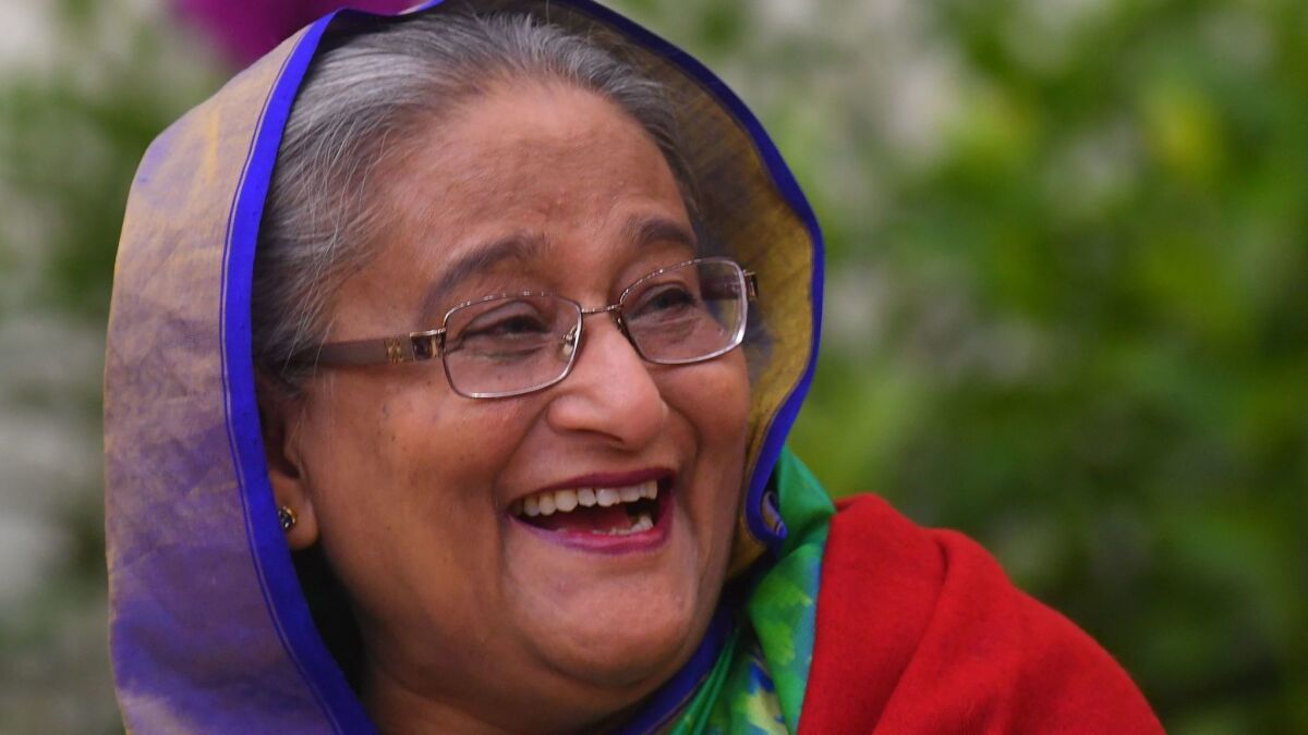 Bangladesh Prime Minister Sheikh Hasina smiles while speaking at a press conference in Dhaka on December 31, 2018.