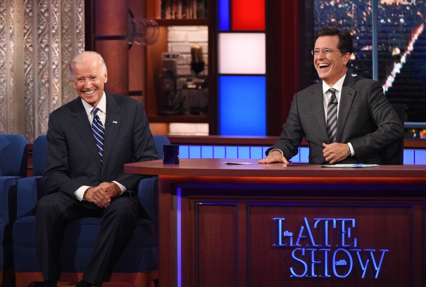 Host Stephen Colbert laughs with Vice President Joe Biden during a taping of "The Late Show with Stephen Colbert," on Sept. 10 in New York.