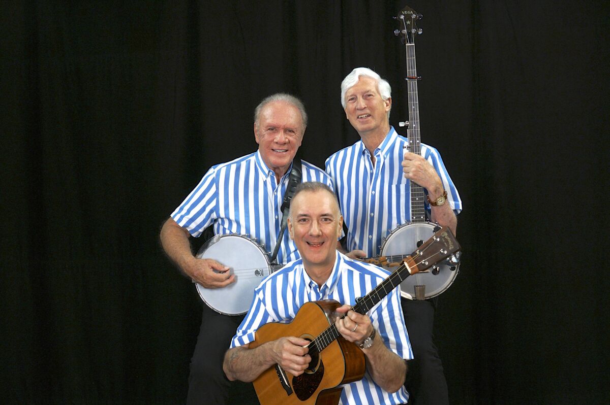 Buddy Woodward, in front, Mike Marvin and Tim Gorelangton will perform as The Kingston Trio in Poway on Sunday.