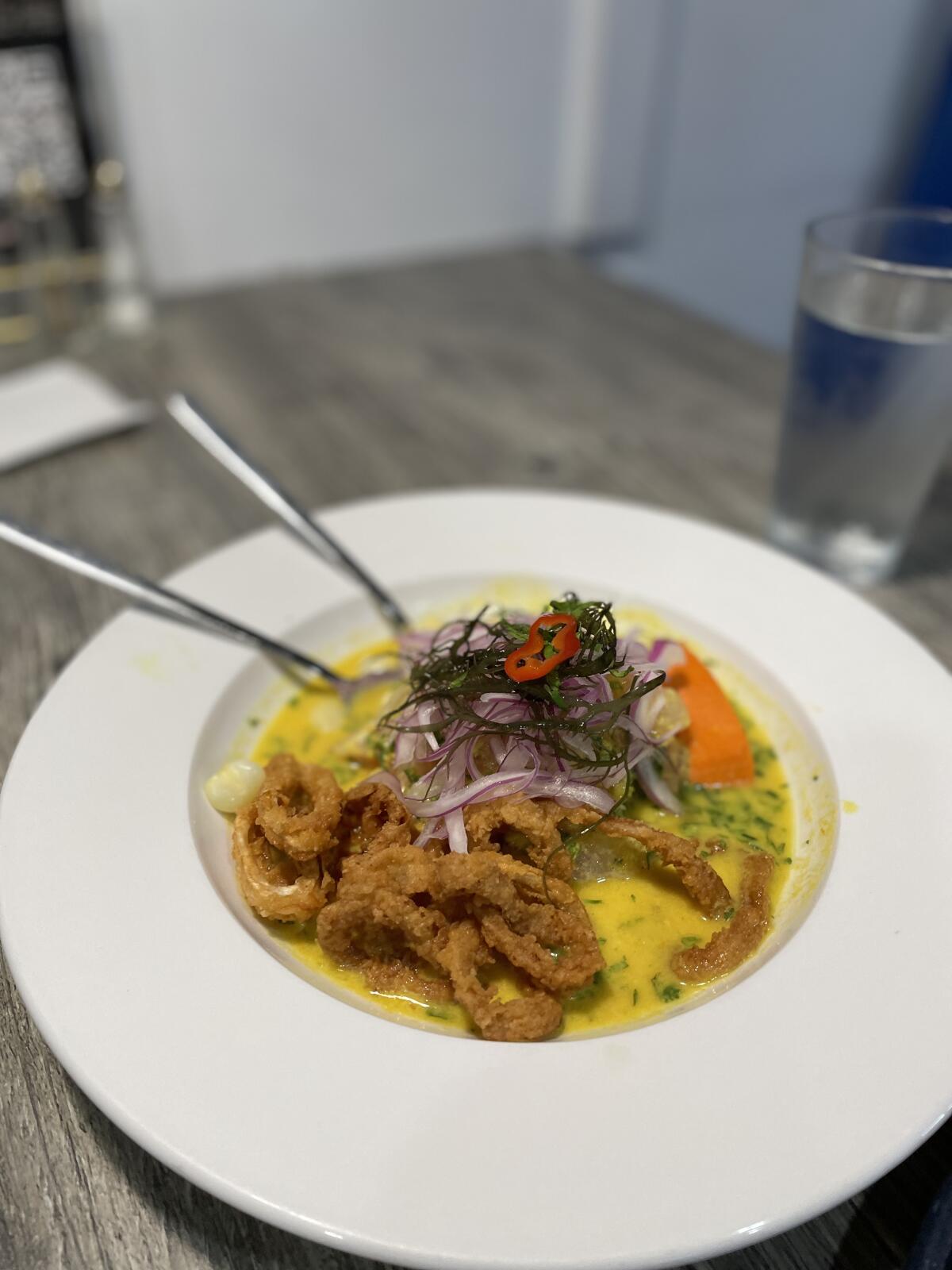 Fish, fried calamari, sweet potatoes and corn are featured in Ceviche 19’s Ceviche Merkado.