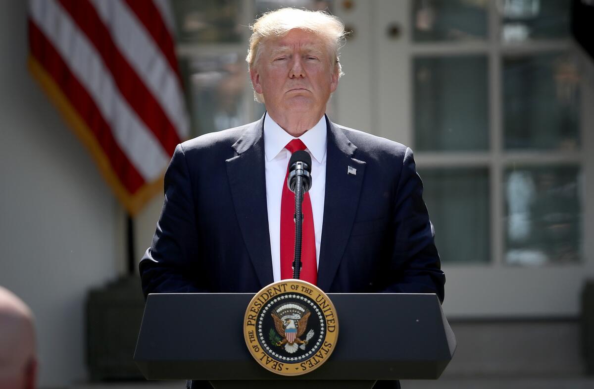 Speaking in the White House Rose Garden, President Trump concludes his announcement to withdraw the United States from the Paris climate agreement.