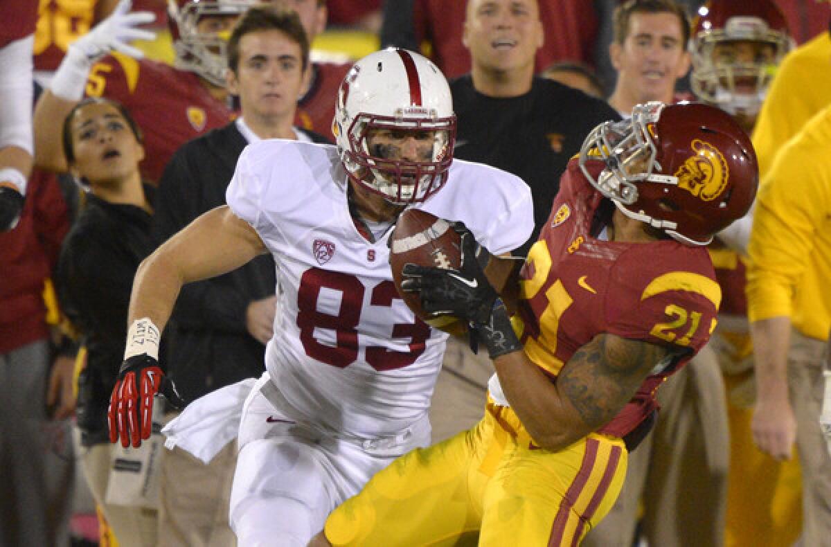 Trojans safety Su'a Cravens intercepts a pass intended for Stanford tight end Davis Dudchock in the fourth quarter Saturday night at the Coliseum.