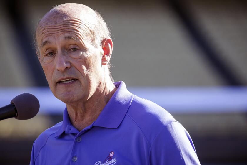 Dodgers CEO Stan Kasten speaks at a news conference launching a COVID-19 vaccination site at Dodger Stadium on Jan. 15, 2021.