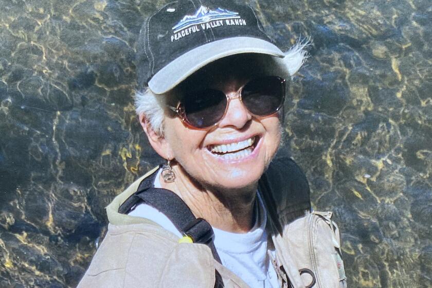 Alice Yee of La Jolla, shown in her fly fishing gear, celebrates 101 years and her activism for women.