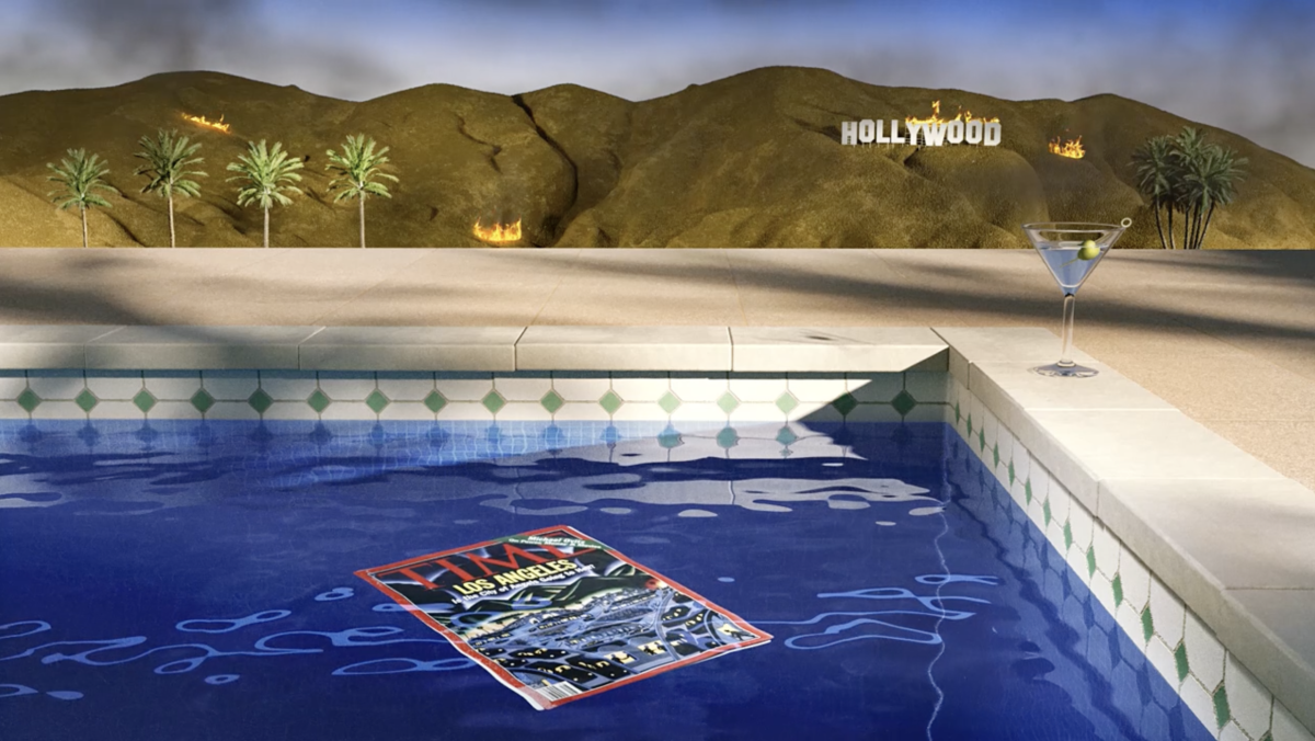 A magazine floats in a pool with the Hollywood sign in the background