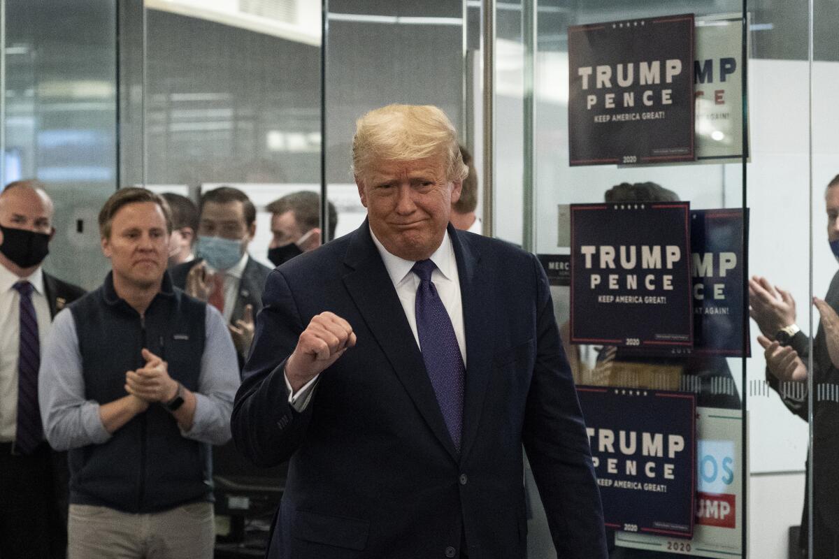 President Trump speaks at the Trump campaign headquarters Tuesday in Arlington, Va.