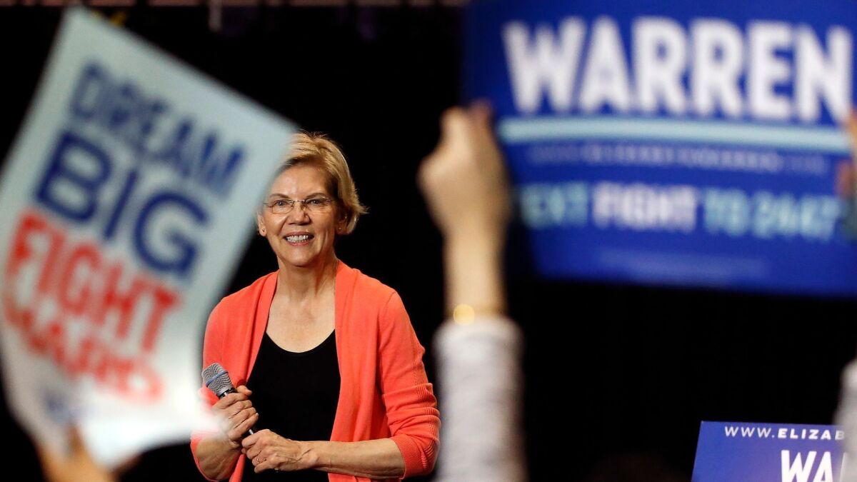 Massachusetts Sen. Elizabeth Warren speaks at a town hall in Miami on June 25, 2019, the night before the first Democratic presidential debate of the 2020 campaign.
