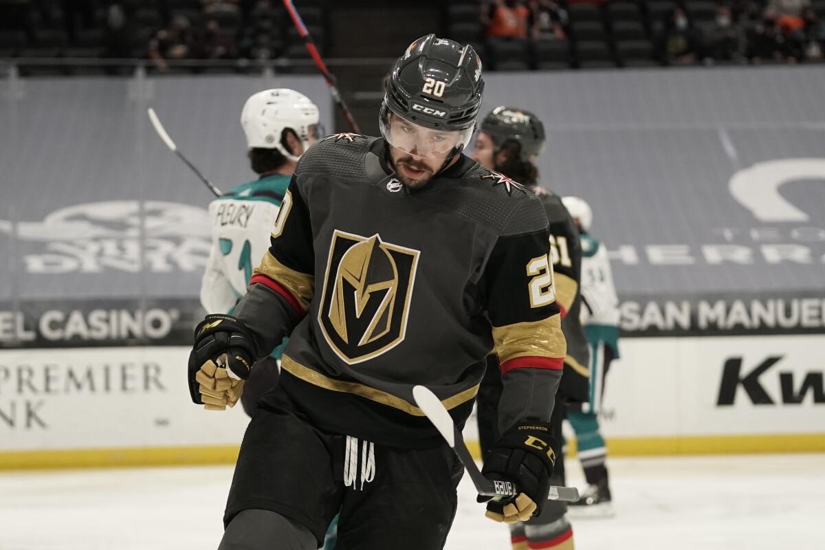 The Golden Knights' Chandler Stephenson, front, celebrates one of his two first-period goals April 24, 2021.