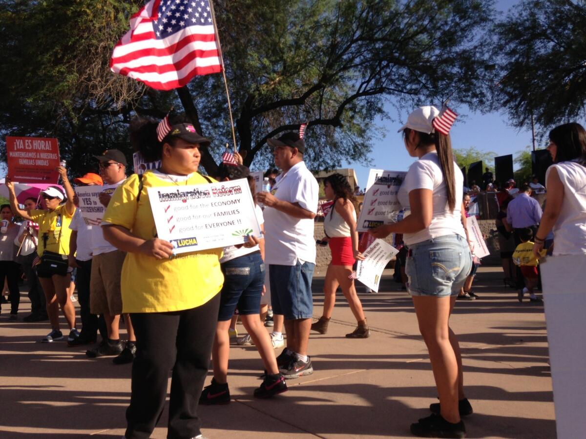 About 300 people gathered at Arizona's state Capitol for a May Day rally. Later, many joined a labor picket line.