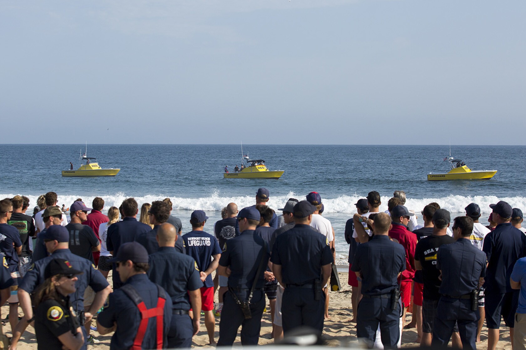 Beach Fills In Remembrance Of Newport Lifeguard Ben Carlson