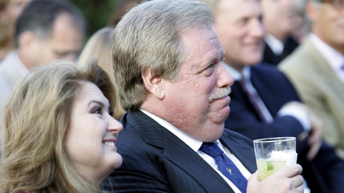 Elliott Broidy and his wife, Robin Rosenzweig, attend an American Ballet Theatre fundraiser in San Marino in 2009.