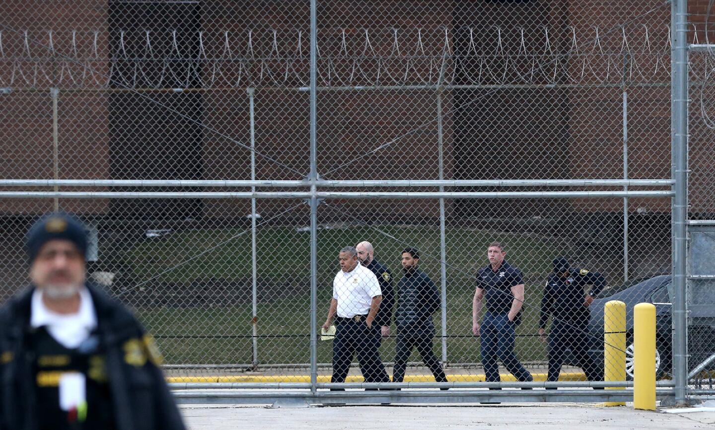 Actor Jussie Smollett (third from right) leaves the Cook County Jail after posting bond on Feb. 21, 2019.